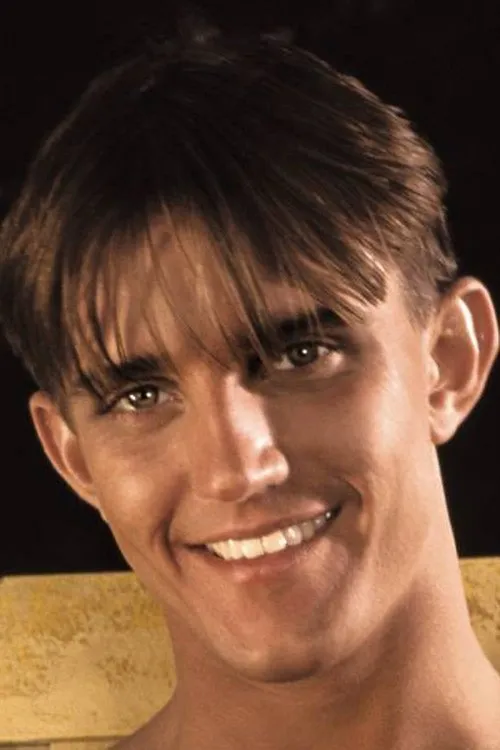 Aaron Brandt interpretando a (credited as Adam West)