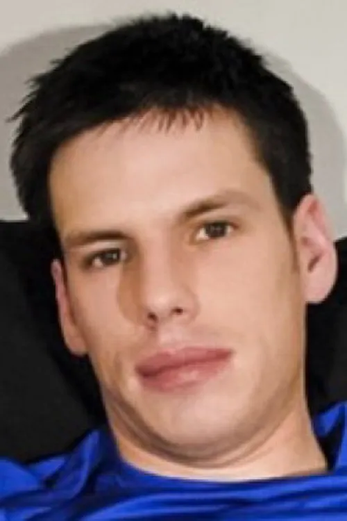 Adam James interpretando a (archive footage)