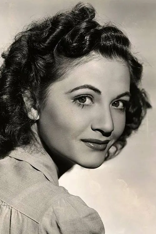 Adele Longmire interpretando a Carmelina LaRue