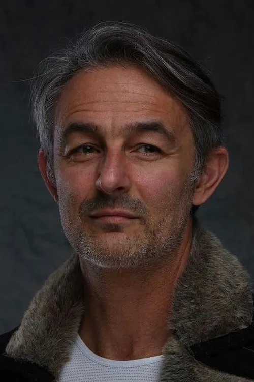 Agis Emmanouil — personaje: Zisimos