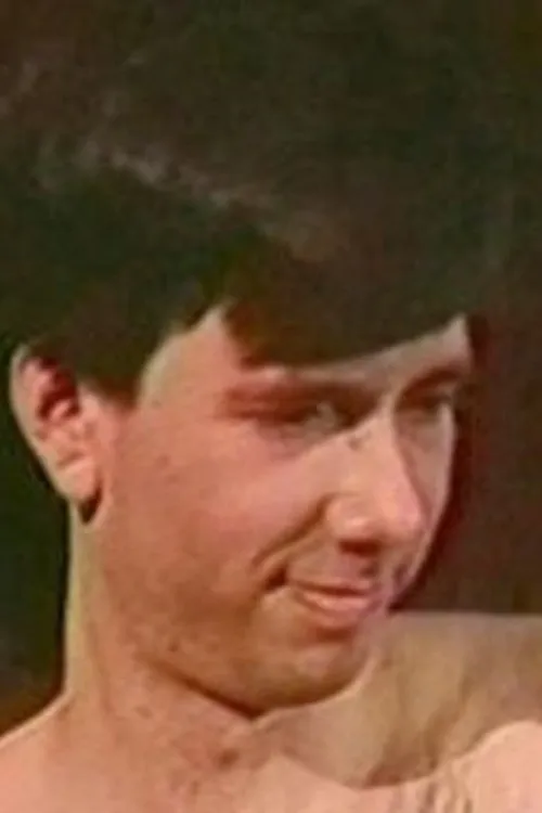 Alan Adrian interpretando a (archive footage)