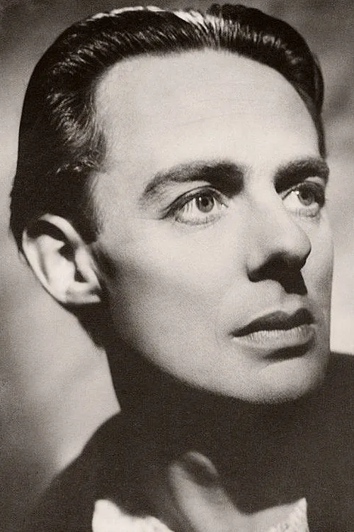 Alec Clunes interpretando a Harry