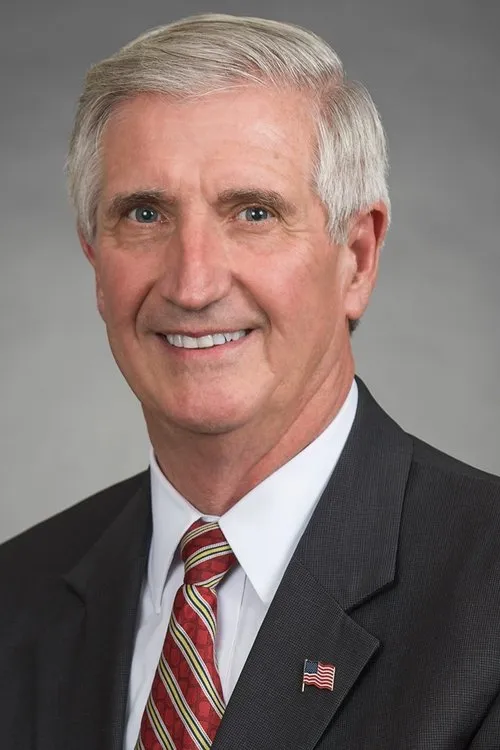 Andrew Card interpretando a Self