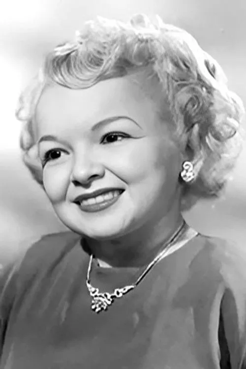 Anne Sholter interpretando a Dolly Burke