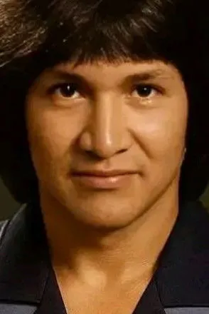 Avent Christie interpretando a Roni