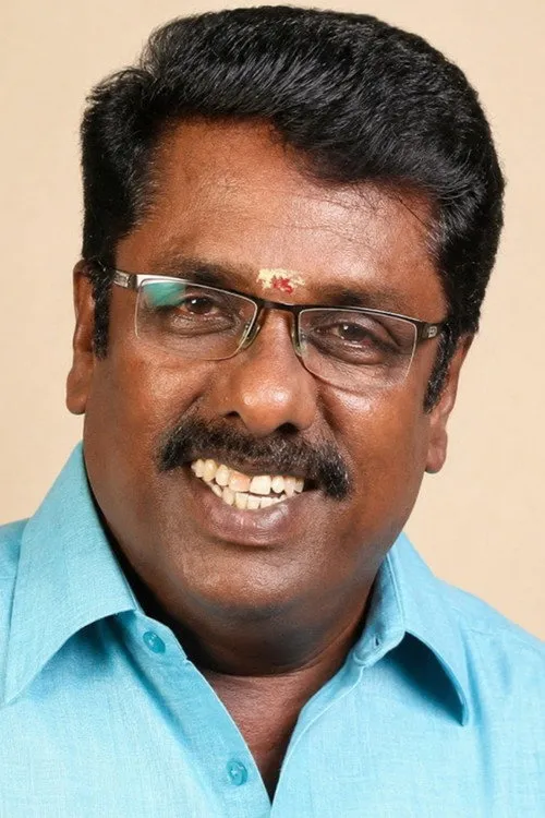 Balu Anand interpretando a