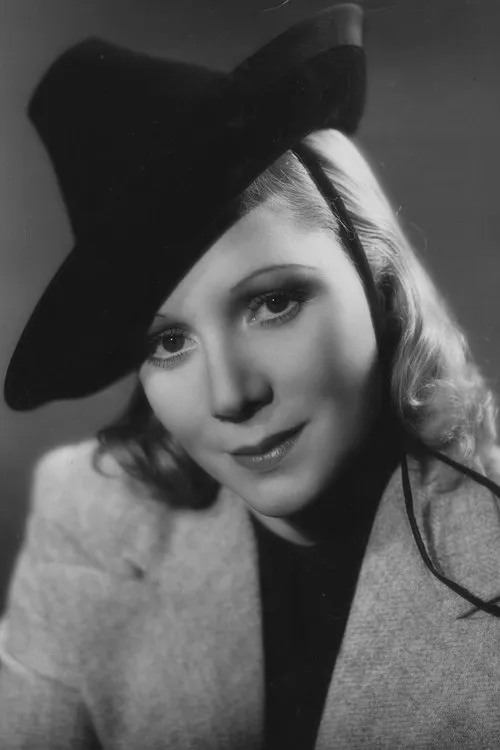 Barbara Blair interpretando a Minnie 'Mousey' Jones