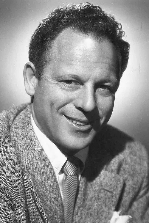 Bill Goodwin interpretando a Mel Gilbert