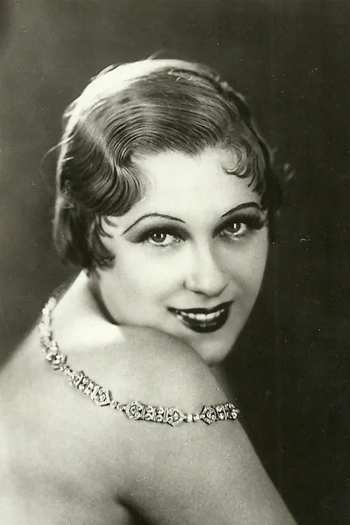 Christiane Delyne interpretando a Madge