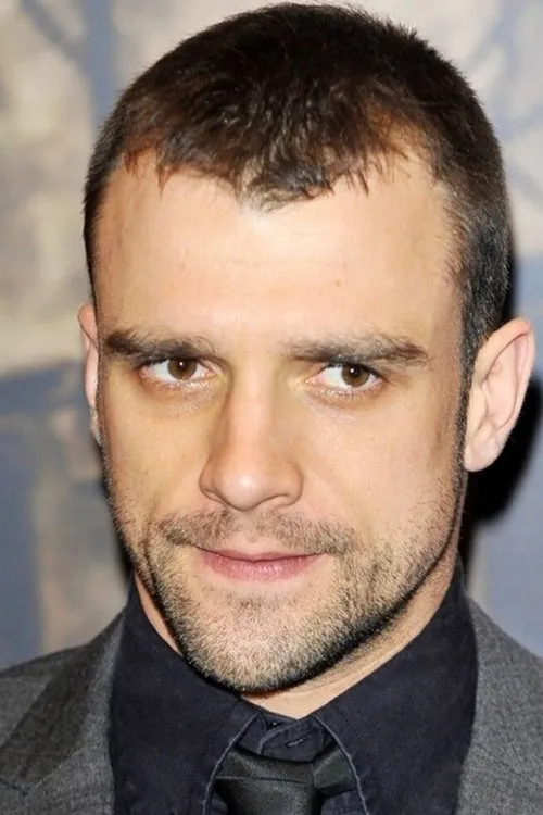 Ciarán Griffiths — personaje: Billy 'The Brick' Porter