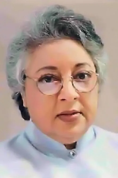 Daisy Irani interpretando a Mrs. Chitra Gujral