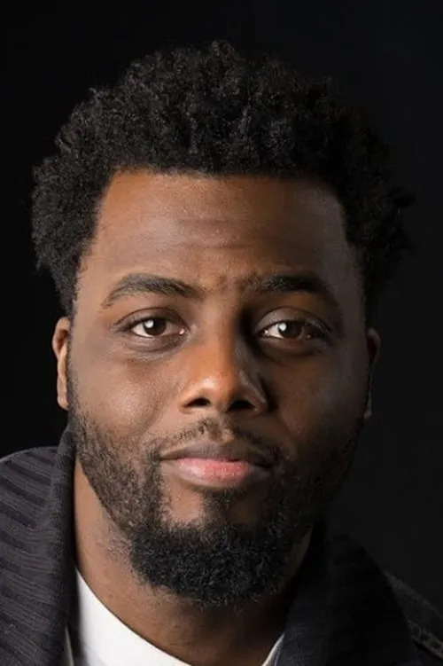 Dwight Layne interpretando a Reverend Oliver