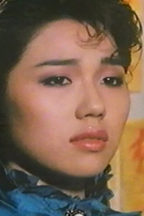 Eliza Yue interpretando a Madam / San