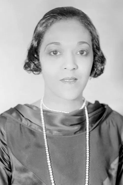 Evelyn Ellis interpretando a Mrs. Barrows