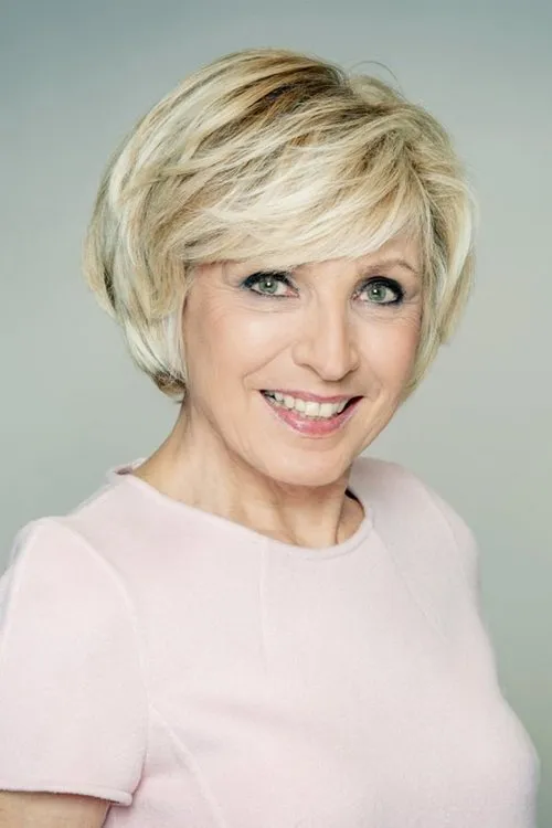 Évelyne Dhéliat — personaje: Self - Presenter