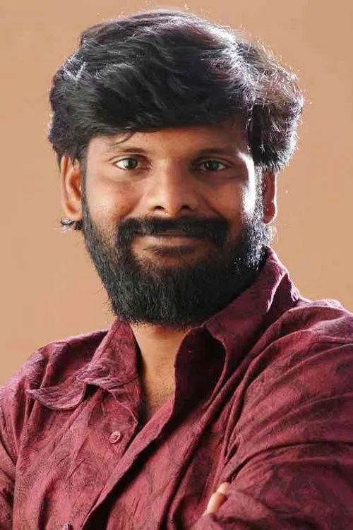 Ganja Karuppu interpretando a Karuppu