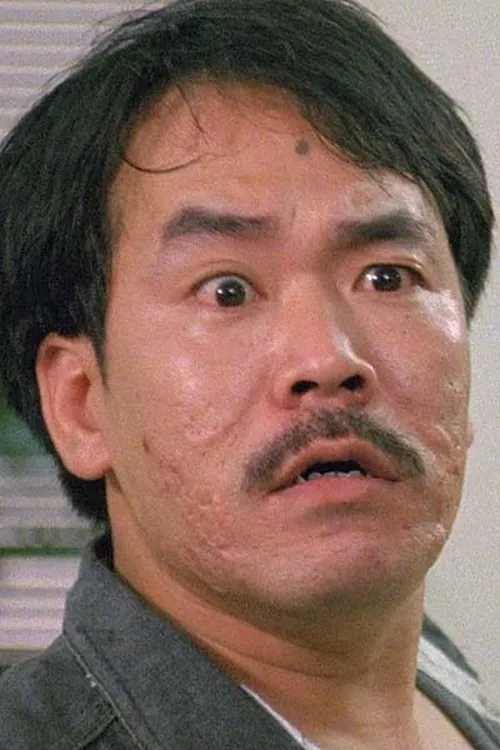 Garry Chan Chi-Shing interpretando a 