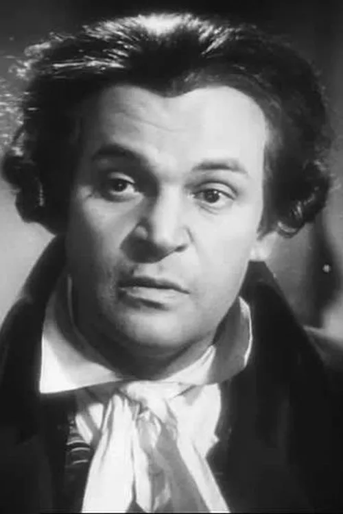 George Snell interpretando a Oscar Hamilton