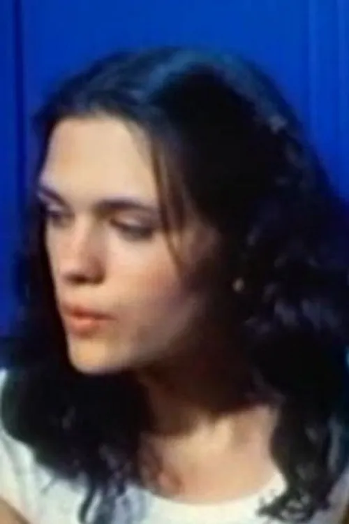 Georgette Sanders interpretando a Model in Orange Dress