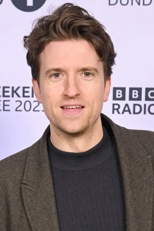Greg James interpretando a Self (archive footage)