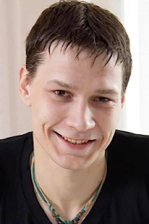 Greg interpretando a 