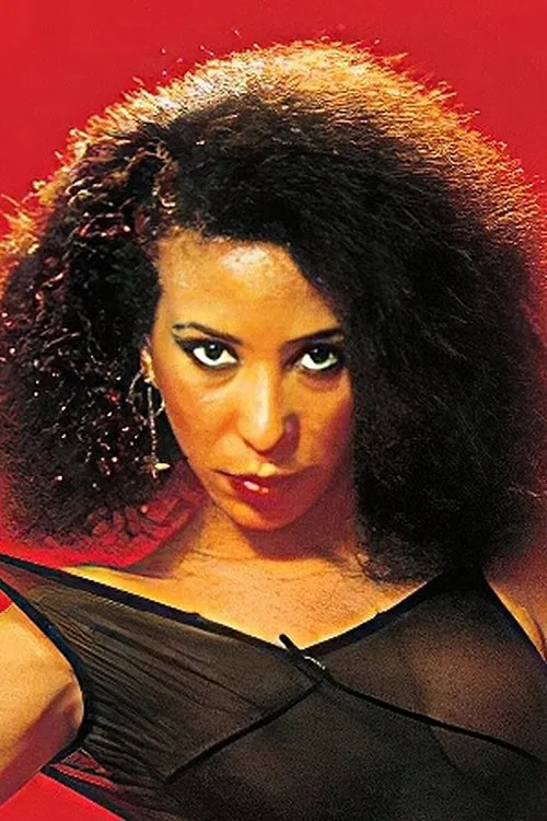 Hitomi Sakae interpretando a Saeko Mejika