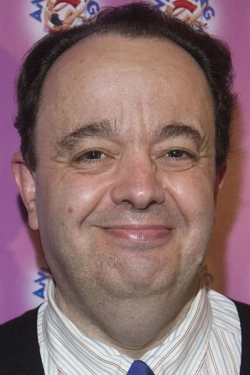 Hugh Sachs interpretando a Rev Donaldson