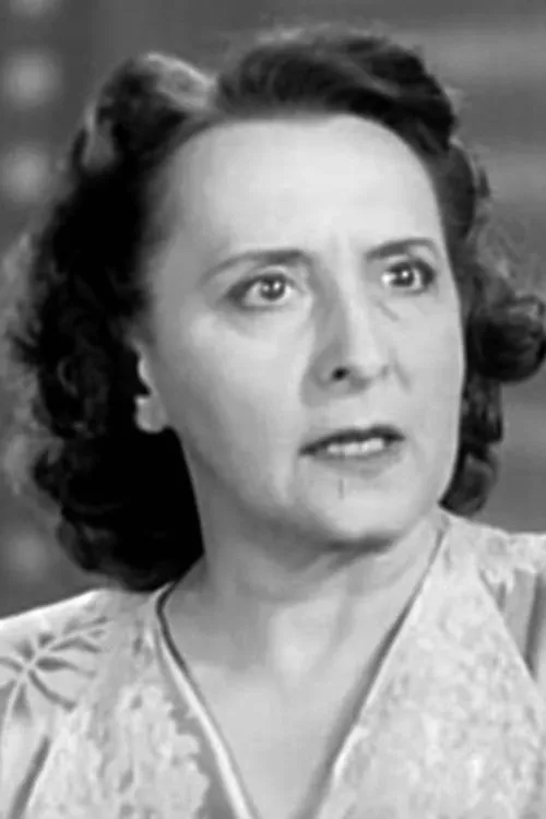 Isabel Randolph interpretando a Mrs. Abigail Uppington