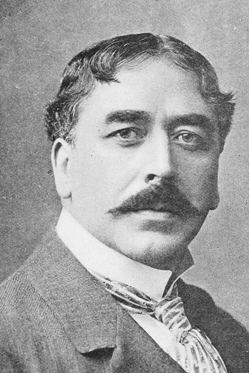 J.H. Gilmour interpretando a