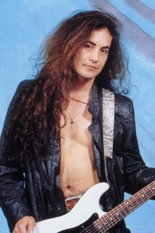 Jake E. Lee interpretando a 