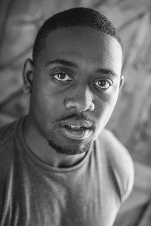 Jason Lamar Ricketts interpretando a David