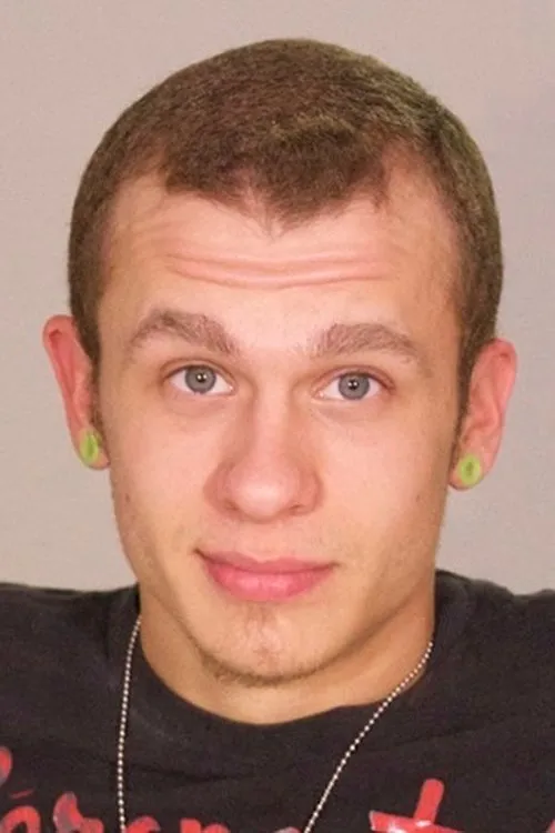 Jayson Lane interpretando a (archive footage)