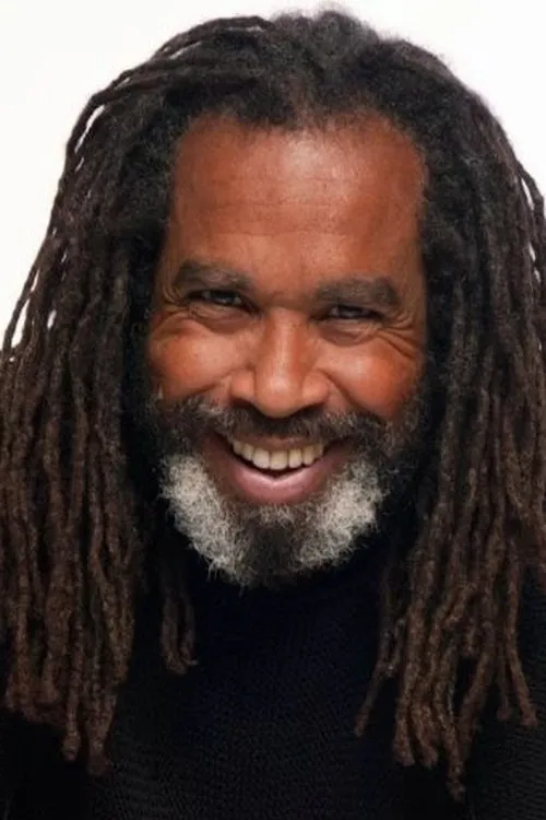 Jean-Claude Naimro interpretando a Self - Keyboards, Backing Vocals