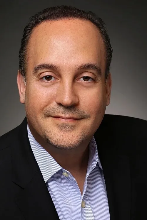 Jeff Lynas interpretando a David Herman