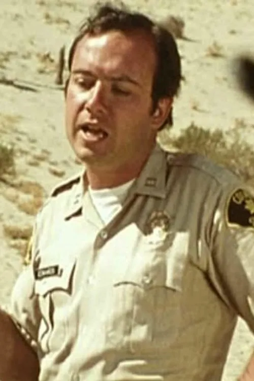 Jim Bohan interpretando a 