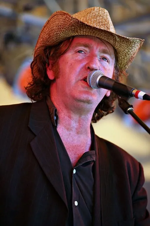 Jim Moginie interpretando a Guitar