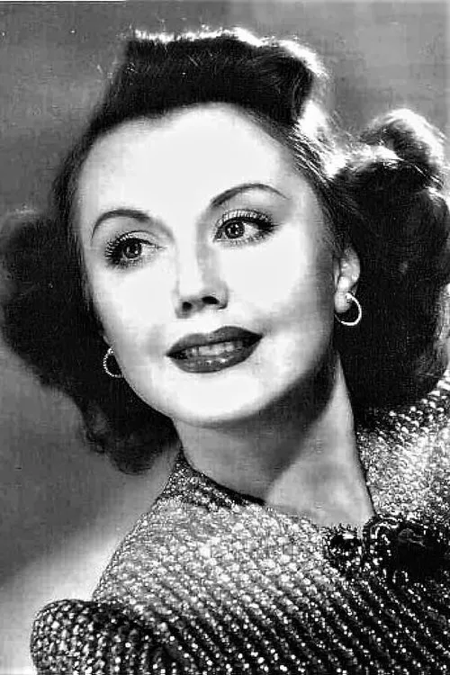 Joan Castle interpretando a Secretary