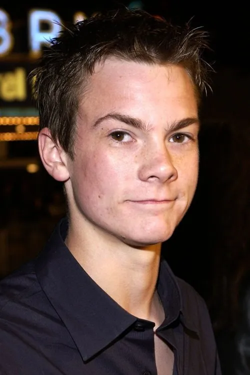 Joel Palmer interpretando a Kevin Singer