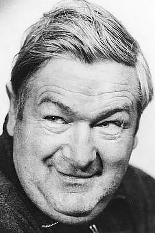 John Kelly interpretando a Michael Driscoll