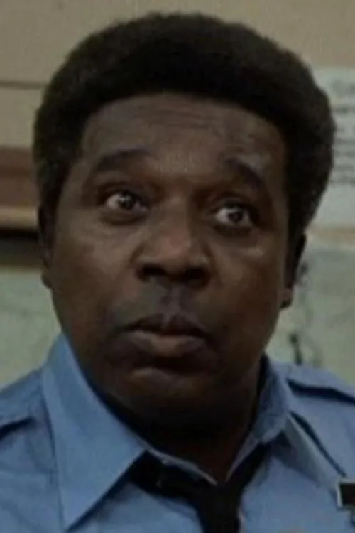 John McCurry interpretando a Sam