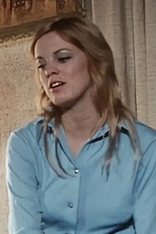 Johnnie Rhodes interpretando a Melissa