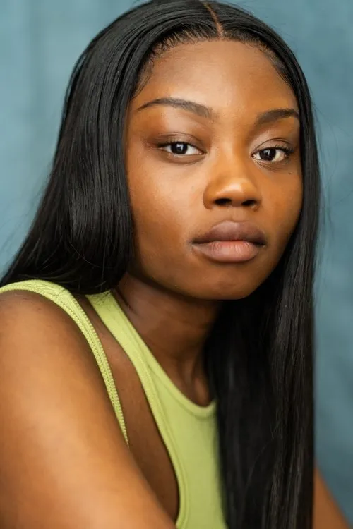 Jola Olajide — personaje: Charlee