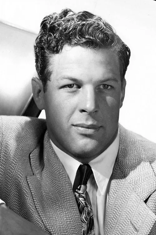 Jonathan Cott interpretando a Floor Director