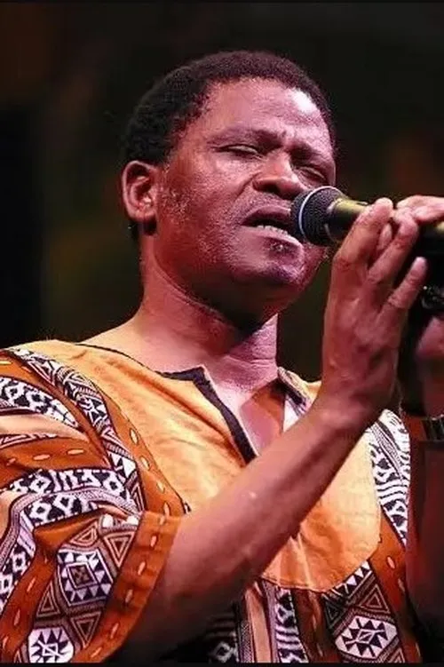 Joseph Shabalala interpretando a Self (archival footage)