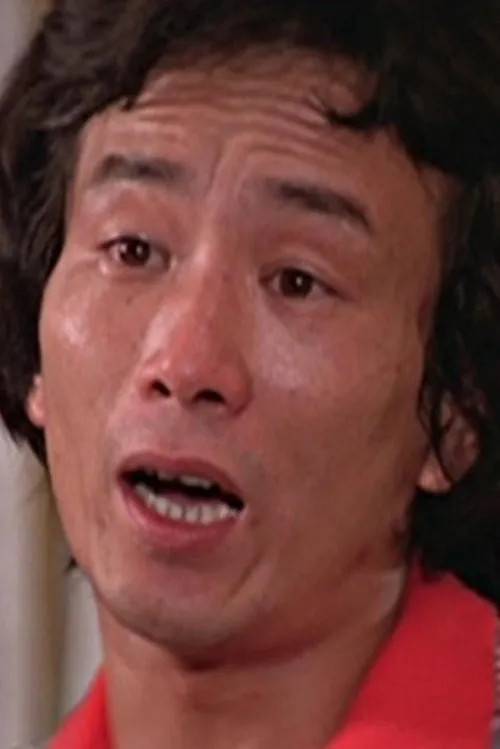 Lam Fai-Wong interpretando a Ah Fai