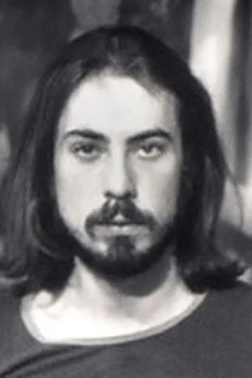 Larry Burns interpretando a (archive footage)