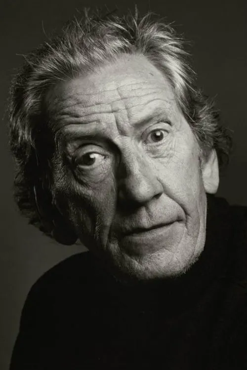 Leonard Maguire interpretando a Gaelic Minister