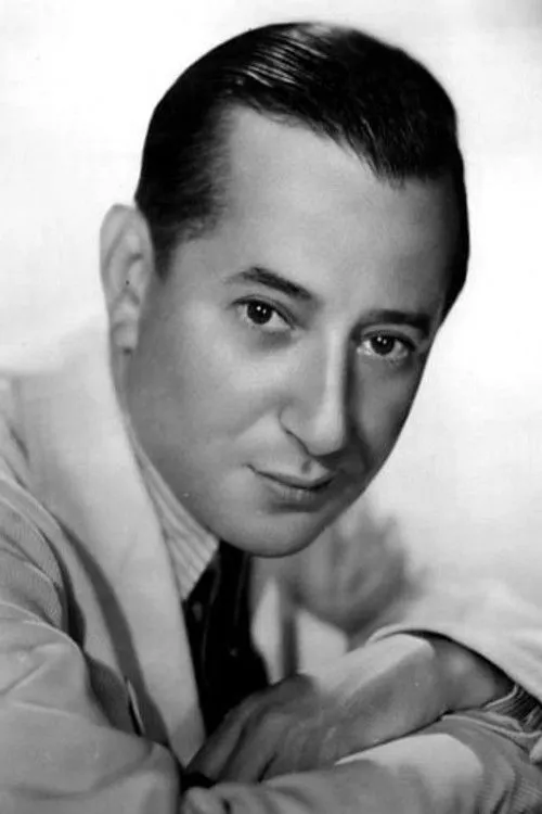 Lou Holtz interpretando a Sam Platz