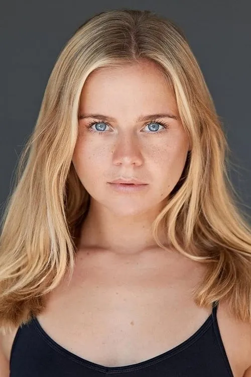 Lucy London interpretando a Olivia Reynolds