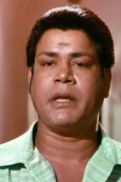 M. R. R. Vasu interpretando a Matrubootham / Bond / Ippi / Thevaram
